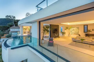 a house with a swimming pool in the backyard at Villa Paradise in Èze