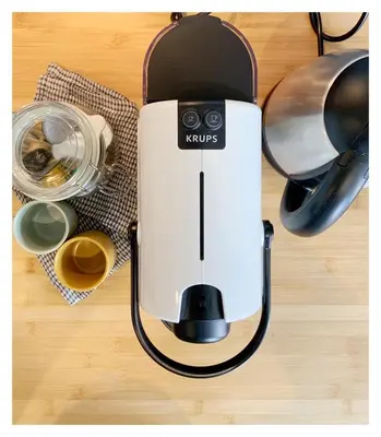 a coffee maker sitting on top of a table at Maison de Côte - Felice in Nice