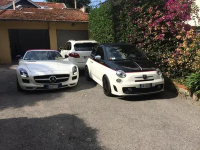 two cars parked next to each other in a driveway at Penthouse Lou Lòu by iVillamia com in Nice