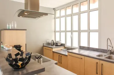 a kitchen with a sink and a counter top at MY CASA - VEILLON - 2 bedrooms - City Center in Nice