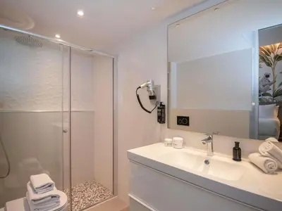 a kitchen with a microwave and some food in it at ibis Styles Beaulieu sur Mer in Beaulieu-sur-Mer