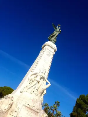 a statue of a woman on top of a tower at Studios Nice French Riviera in Nice