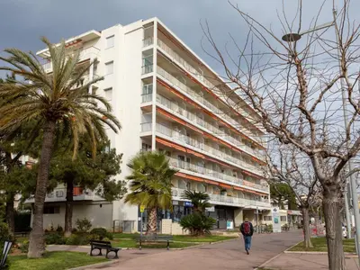 a large white building on the side of a street at Apartment L'Angelina-1 by Interhome in Cros-de-Cagnes