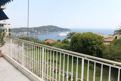 a balcony with a view of the ocean at La Reale in Villefranche-sur-Mer