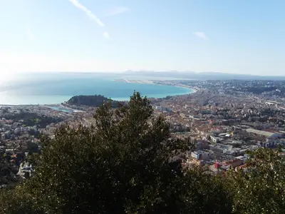 a view of a city and a body of water at Les lilas blancs in Villefranche-sur-Mer