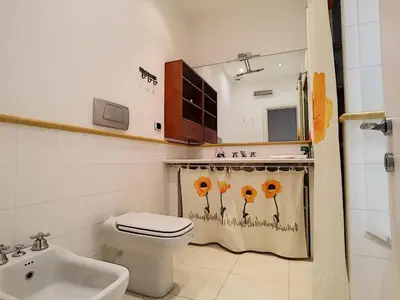 a white bathroom with a toilet and a sink at Nestor&Jeeves - PALAIS NICOLE - Central - Very close sea in Nice