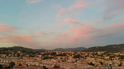 a view of a city under a cloudy sky at La maison de lulu in Nice