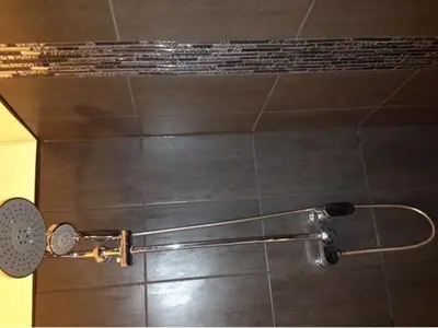 a shower in a bathroom with a shower curtain at LE MIRAGE, SEA FRONT view, 3 bedrooms, 100m in Nice
