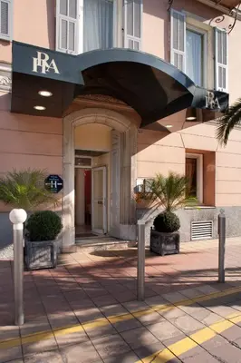 a building with a sign that says rca on it at Hôtel Relais Acropolis in Nice