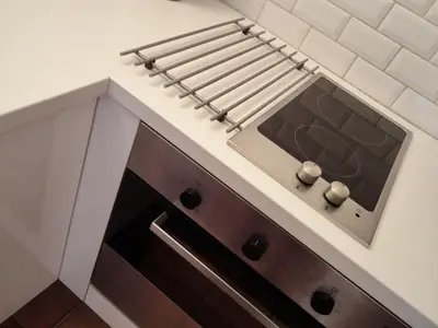 a kitchen with a stove top oven in a kitchen at Rue Neuve - Old Town Apartment in Nice