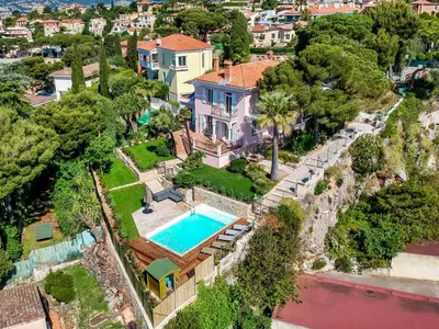 an aerial view of a house with a swimming pool at Stunning seaview villa. Villefranche Sur Mer in Villefranche-sur-Mer