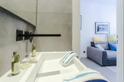 a living room with a sink and a couch at MY CASA - PAULE - Great Old Town Studio w AC in Nice