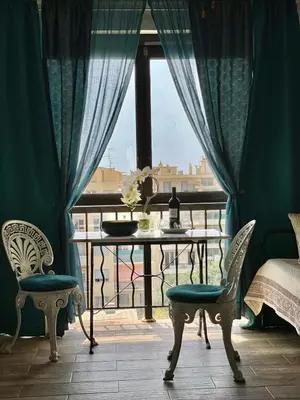 a room with a table and chairs and a window at Luxurious Studio in NICE 450 m of the sea in Nice