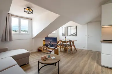 a living room with a couch and a table at 