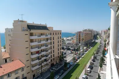 an aerial view of a city street with buildings at Top Floor Apartment Santa Barbara in Nice