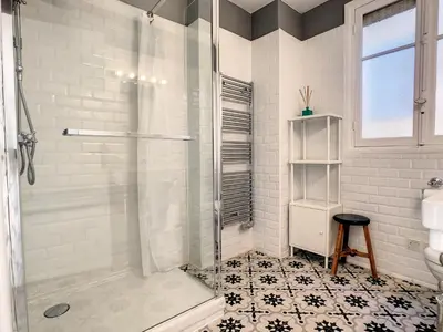 a bathroom with a shower and a toilet and a sink at Nestor&Jeeves - SUNNY TERRACE - Central - Very close sea - Top Floor in Nice
