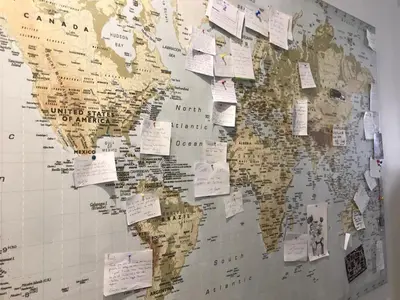 a large map of the world with notes on it at Nissa la Bella in Nice
