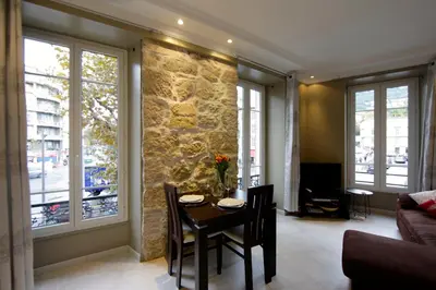 a bedroom with a large bed and a window at Apartment with parking in Nice near the harbor in Nice