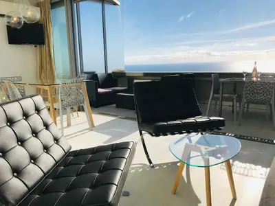 a living room with a couch and a table at COSTA PLANA COLLECTION - Cap d'Ail - Monaco in Cap d'Ail