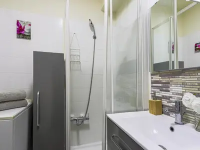 a bathroom with a shower and a sink at Studio Ciel de Fabron by Interhome in Nice