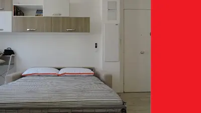 a living room with a couch and a dining room at NICE FRANCE Apartment 2 rooms max 4 persons in Nice
