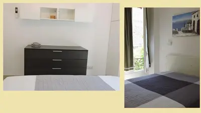 a couch with four pillows on it in a room at NICE FRANCE Apartment 2 rooms max 4 persons in Nice