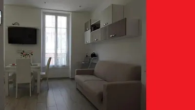 a white table with two plates of food on it at NICE FRANCE Apartment 2 rooms max 4 persons in Nice