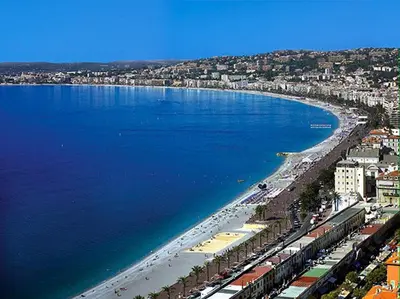 an aerial view of a beach and the ocean at Centre, deux pièces, calme, terrasse plein sud in Nice