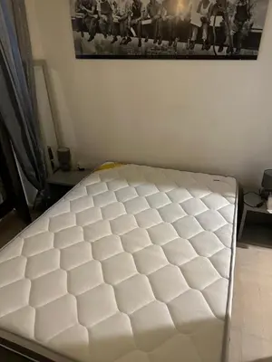 a white mattress sitting on a floor in a room at GRAND H -F2, FACE VIEUX- NICE, TERRASSE, ASCENSEUR, CLIMATISATION, Terrace - Nice city center in Nice