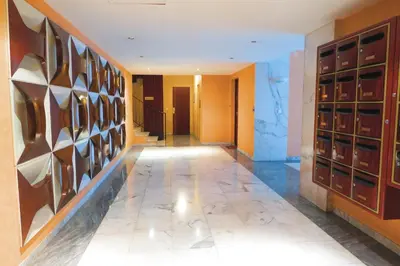 a hallway with wine racks in a hotel room at Nestor&Jeeves - DEBUSSY TERRASSE - Central - By shopping area in Nice