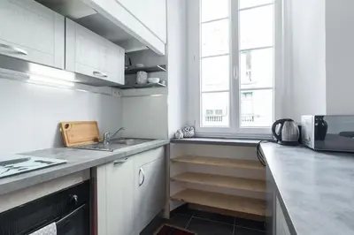 a kitchen with a sink and a counter top at Nicelidays - Le Suede - Carré d'or - 2min from beaches in Nice