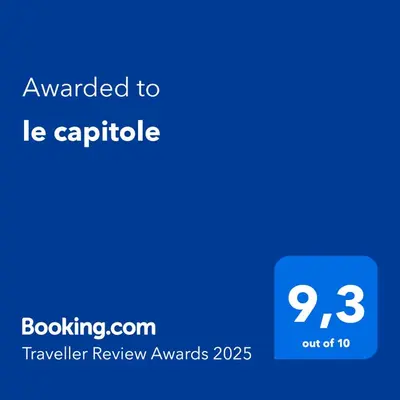 a blue text box with the words awarded to le capricle at le capitole in Nice