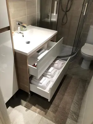 a bathroom with a sink and a shower at AzurAppart Elegant Studio Centre in Nice