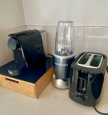 a kitchen appliance sitting next to a blender on a counter at Nice Port, French Riviera in Nice