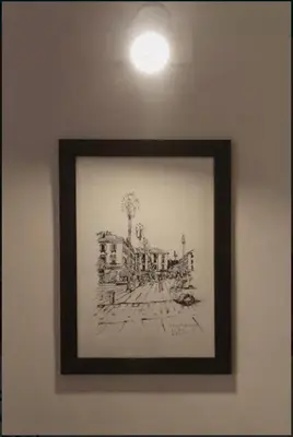 a framed picture of a house on a wall at Nice Renting - COLONNA - Best place in Nice Old Town in Nice
