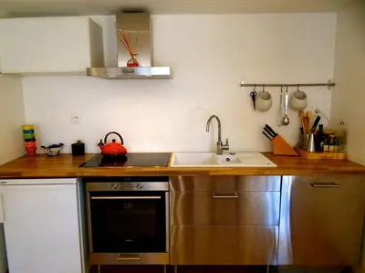 a kitchen with a sink and a counter top at Le Noble in Scenic Villefranche Sur Mer in Villefranche-sur-Mer