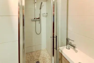 a bathroom with a shower and a sink at Lovely Cosy Flat in Nice old town in Nice