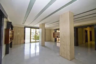 a large room with pillars in the middle of a building at PROMENADE HOLIDAY - ORIENT & SEA in Nice
