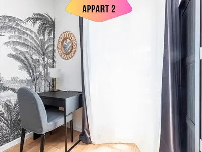 a desk with a chair next to a window at CASA REINE JEANNE- ideal groups & family -CENTRAL near train station - PARKING - New&CONFORT-AC in Nice