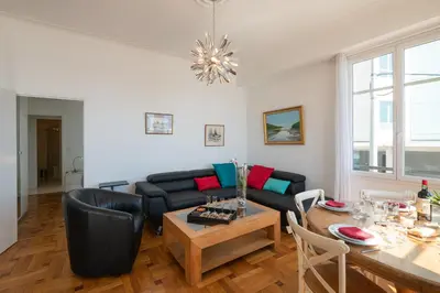 a living room with a couch and a table at 