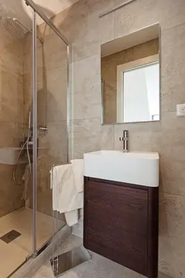a bathroom with a sink and a shower at Residence Tonduti in Nice