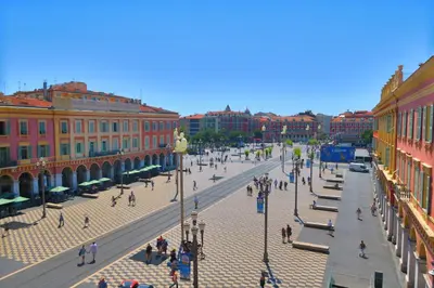 a group of people walking around a city street at Nestor&Jeeves - TROIS PROMENADE - Central - Very close sea in Nice
