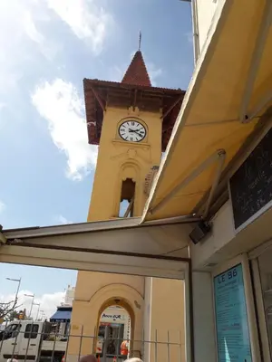 a clock tower on top of a building at Chambre chez l’habitant chez Nadine in Cagnes-sur-Mer