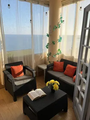 a living room with two chairs and a couch at France Nice Promenade Des Anglais 80m² Piano in Nice