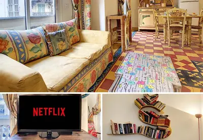 a living room with a couch and a tv at Nestor&Jeeves - SIXTIES - Central - Very close sea - Retro in Nice