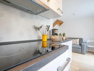 a kitchen with a sink and a counter top at Apartment Wilson by Interhome in Nice