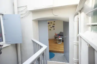 a view from the hallway of a house at Ze Perfect Place - Superbe Studio Vieux Nice - calme et climatisé in Nice