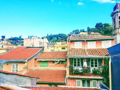 a group of buildings with red tile roofs at Ze Perfect Place - Superbe Studio Vieux Nice - calme et climatisé in Nice