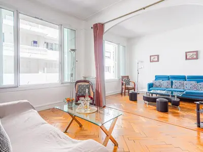 a living room with a couch and a table at Apartment Le Rossi by Interhome in Nice
