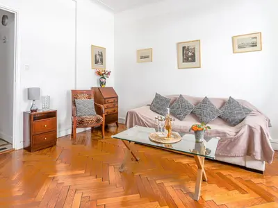 a living room with a couch and a coffee table at Apartment Le Rossi by Interhome in Nice